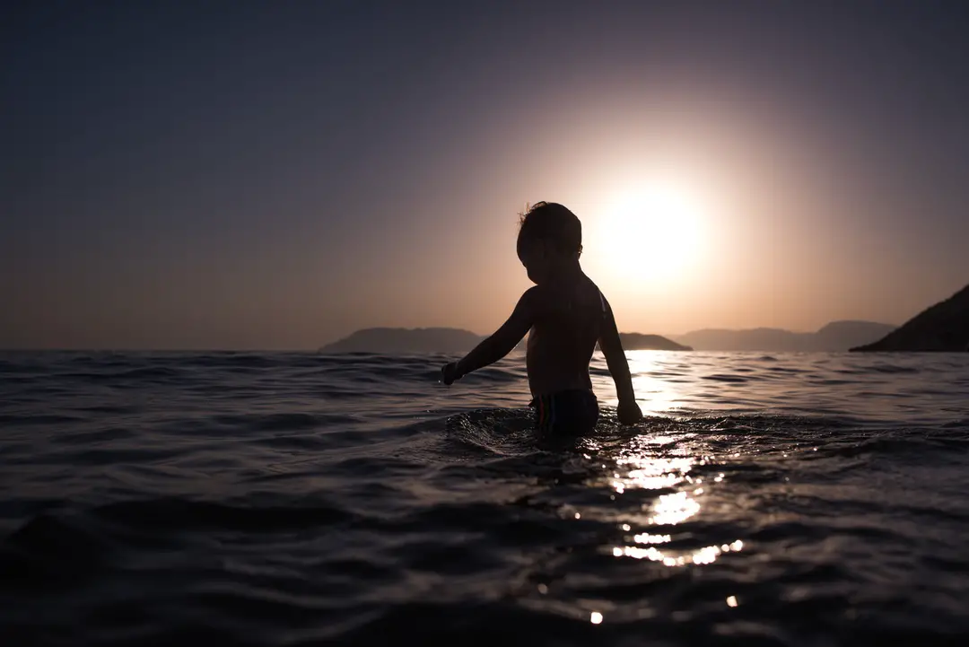 Child in the sea