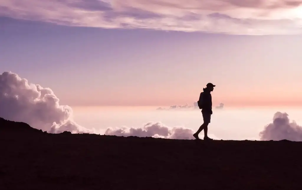 man walking, looking, and thinking