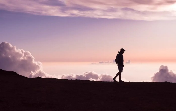 man walking, looking, and thinking