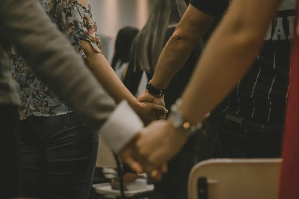bible scripture about forgiving others holding hands as a community of believers
