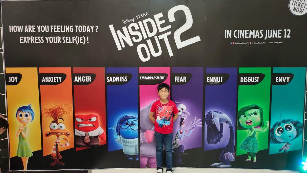Inside out 2 caleb posing in front