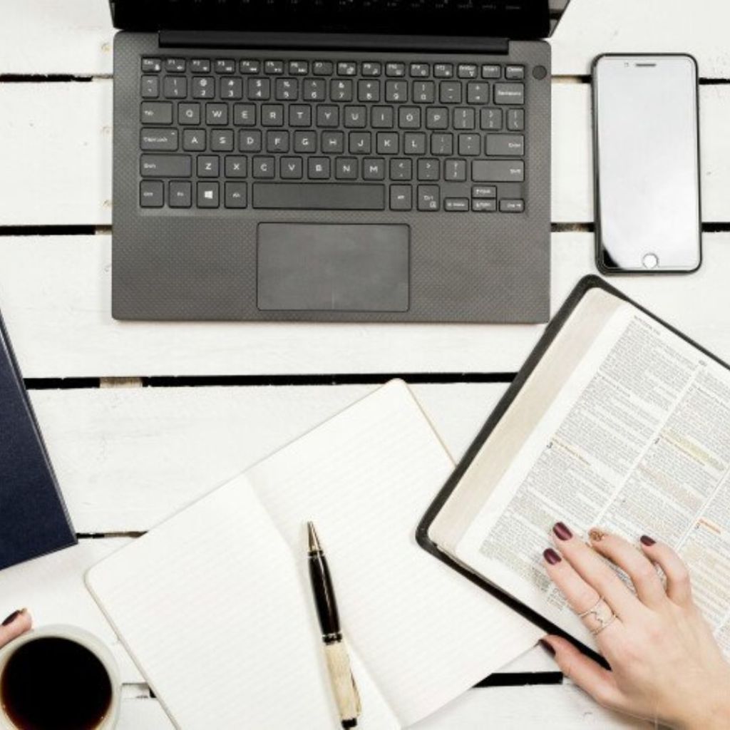 bible study and reading with bible pen laptop phone coffee