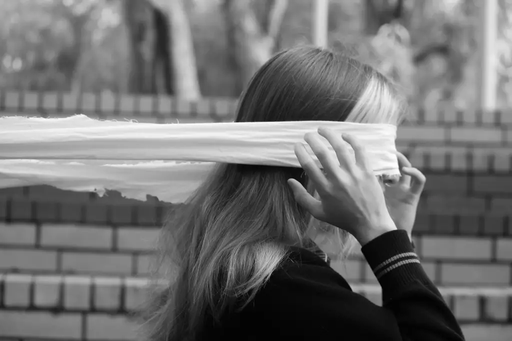 a woman blindfolded signifying spiritual blindness