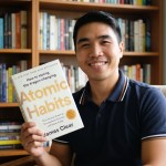 joshua infantado holding the book atomic habits